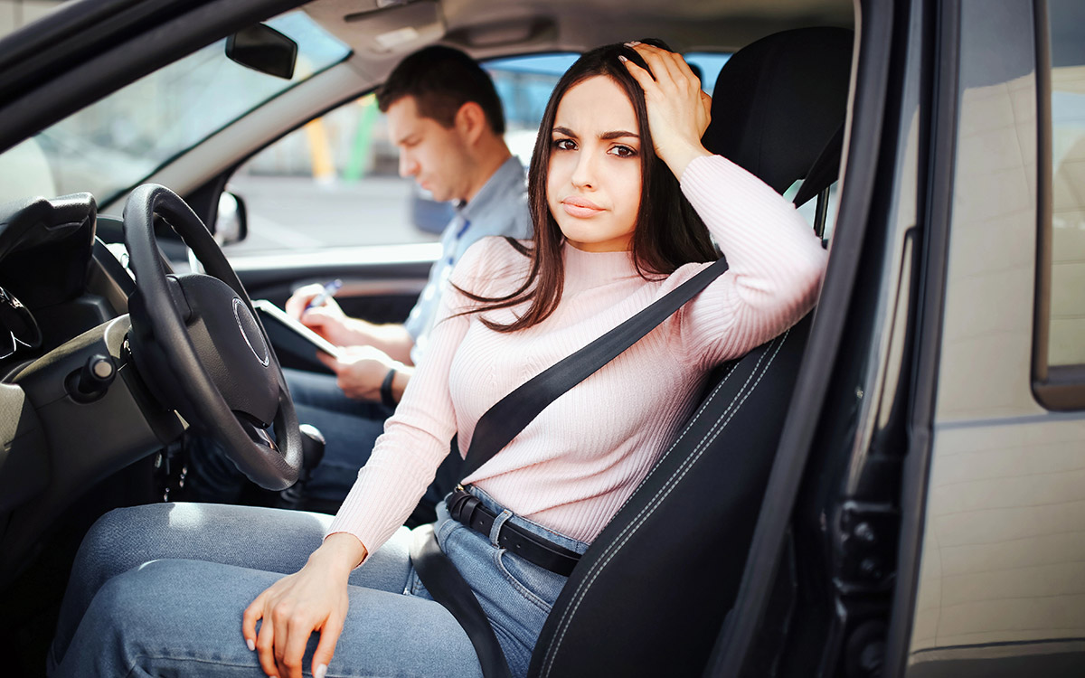 woman in her car after accident