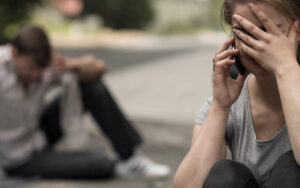 woman on the phone after pedestrian accident